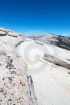 View from the top of the back side of Half Dome in Yosemite National Park in California USA