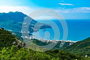 View from the top of the Budva Riviera. The coast from Sveti Stefan to the Becici city on the Adriatic Sea in Montenegro
