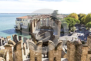 View from the top of the castle walls of Scaliger Castle inside Lake Garda. Sirmione, Italy. Nature and history