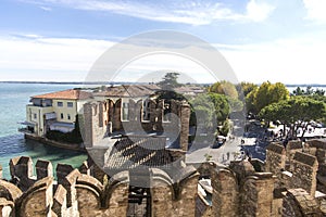 View from the top of the castle walls of Scaliger Castle inside Lake Garda. Sirmione, Italy. Nature and history