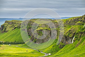 view from the top of a cliff near Seljalandsfoss Waterfall, Iceland