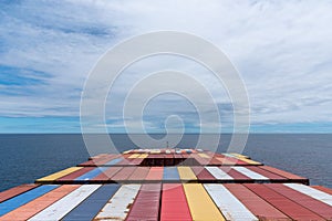 View on the top of containers loaded on deck of the large cargo ship.