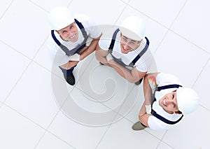 View from the top - group of construction workers