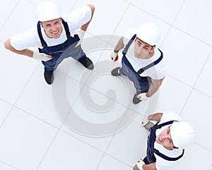 View from the top - group of construction workers