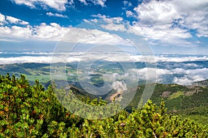 View from top of the hill Sivy vrch in Western Tatras at Slovakia through inversion. Beautiful summer mountain landscape