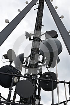 View on the top of look-out tower with antennas and amplifiers in Uetliberg mountain photo