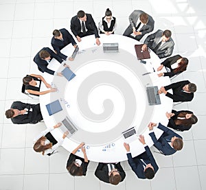 View from the top.meeting of shareholders of the company at the round - table. photo