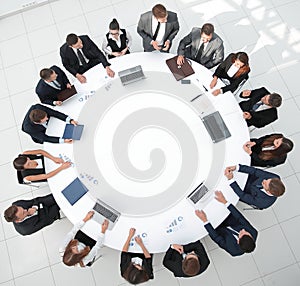 View from the top.meeting of shareholders of the company at the round - table. photo