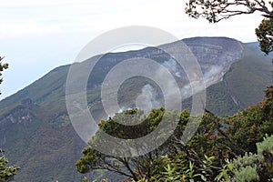view of the top of Mount Gede from the top of Mount Pangrango during the day
