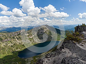 The view from the top of the mountain. Golden Lake in the Ergaki Nature Park