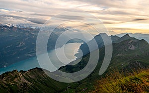 view from the top of a mountain to lake during sunset, brienzer rothorn switzerland alps