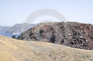 View from the top of Nea Kameni to island Santorini