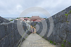 Shuri Castle rampart overlooking Okinawa skyline in Naha, Okinawa, Japan