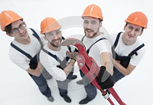 View from the top.the team of plumbers showing gas keys