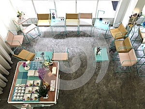 View from top to meeting place with colorful modern chairs