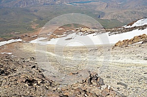 Sulfuric slops of Damavand volcano near summit photo