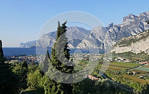 View of Torbole and the mountains on the shores of Lake Garda. Torbole am is a popular vacation spot in Northern Italy.