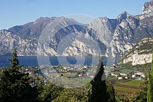 View of Torbole and the mountains on the shores of Lake Garda. Torbole am is a popular vacation spot in Northern Italy.