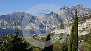 View of Torbole and the mountains on the shores of Lake Garda. Torbole am is a popular vacation spot in Northern Italy.