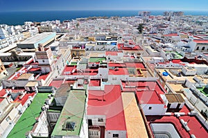 View from Torre Tavira tower to colorful roofs of Cadiz, Costa de la Luz, Andalusia, Spain photo