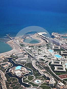 View on the touristic resort and Red Sea from an airplane