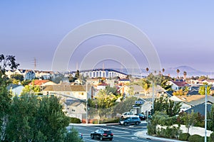 View towards Bayshore Freeway from a residential neighborhood in Foster City at sunset, San Francisco bay area, California photo