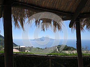 View towards Capri island from the seashore. Napoli, Italy