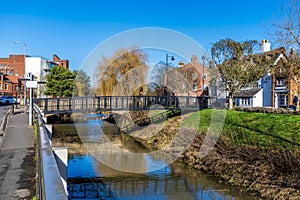 A view towards a footbridge over the River Welland opposite Welland Place in the centre of Spalding, Lincolnshire photo