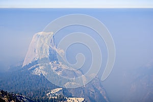 View towards Half Dome on a day with smoke covering the landscape; Yosemite National Park photo