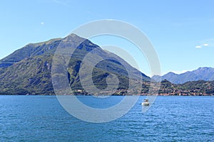 View towards lakeside city Bellagio at Lake Como with mountains in Lombardy, Italy