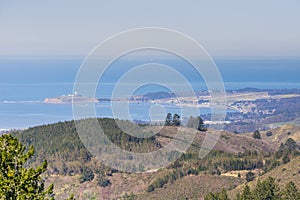 View towards the Pacific Ocean and Pillar Point Harbor from Purisima Creek Redwoods Park on a clear day; Farallon Islands visible photo