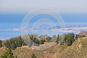 View towards the Pacific Ocean and Pillar Point Harbor from Purisima Creek Redwoods Park on a clear day; Farallon Islands visible photo