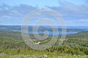 View towards rugged landscape and ocean inlet in Newfoundland