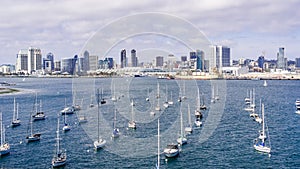 View towards San Diego`s downtown area, ships moored in San Diego Bay on the forefront, south California photo