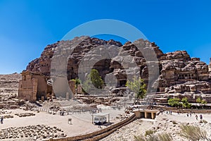 A view towards temple ruins and the western cliff face in the ancient city of Petra, Jordan