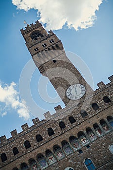 A view of Tower of Arnolfo and his big clock in Signoria Square, Florence, Tuscany photo