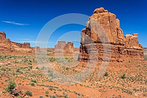 View of Tower of Babel Courthouse Towers and Three Gossips in Arches National Park Utah USA photo