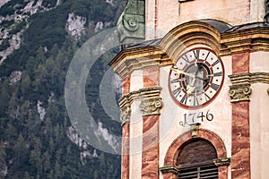 view on the tower of the catholic church saint peter and paul in mittenwald