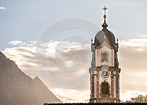 view on the tower of the catholic church saint peter and paul in mittenwald