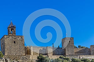 View of the Tower of the Homenaje or clock Pabellonotas and the Torre Blanca with its fortress at the Alcazaba