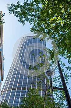 View of a tower in Paris, France, behind the trees