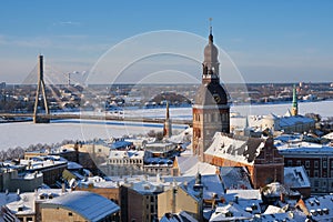 View from tower of Saint Peters Church on Riga Cathedral and roofs of old houses in old city of Riga, Latvia in winter