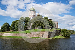 View of the tower of St. Olaf on a summer day. Vyborg Castle