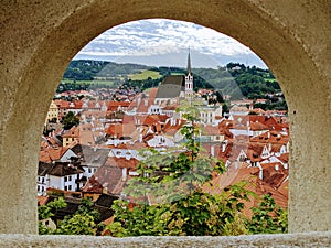 View of the town of Cesky Krumlov through the walls of the town`s Castle
