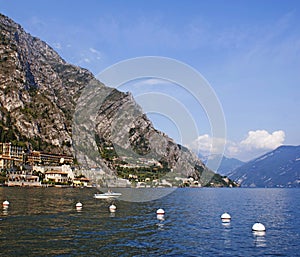 View on a town Limone on lake Garda and the Alpes.