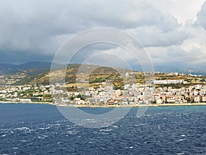 View of town Reggio di Calabria from sea photo