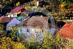 View of the town Resita in Banat. Typical landscape in the forests of Transylvania, Romania. Autumn view.