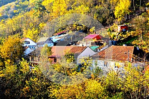 View of the town Resita in banat.  Wonderful typical landscape in the forests of Transylvania, Romania. Autumn view.