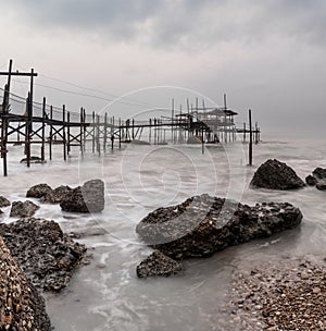 view of the Trabocco Cungarelle pile dwelling on an overcast an rainy day on the Costa dei Trabocchi in Italy