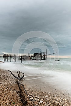 view of the Trabocco Punto le Morge pile dwelling on an overcast an rainy day on the Costa dei Trabocchi in Italy